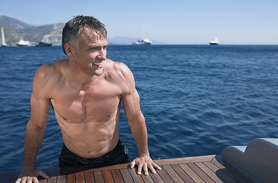 Mature man with muscular body that is possible with body sculpting treatments like CoolSculpting