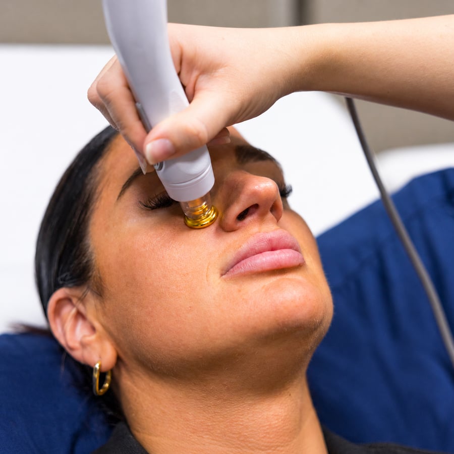 Bodenvy client relaxing during her Sofwave lifting treatment